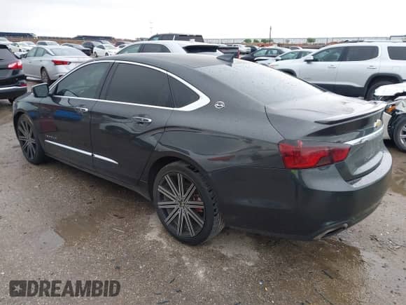 2015 Chevrolet Impala LTZ with VIN 1G1155SL8FU135991, listed as a IAAI auction lot 41895946 with 150,332 mi miles and . Bid and sale history available at DreamBid. Image 3.