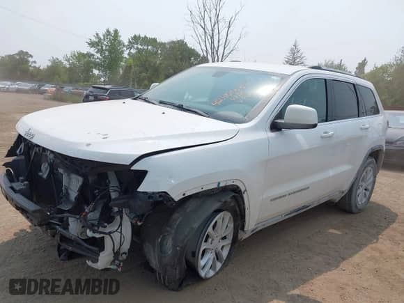 2021 Jeep Grand Cherokee Laredo E with VIN 1C4RJFAG2MC502774, listed as a IAAI auction lot 42401687 with 47,553 mi miles and . Bid and sale history available at DreamBid. Image 2.