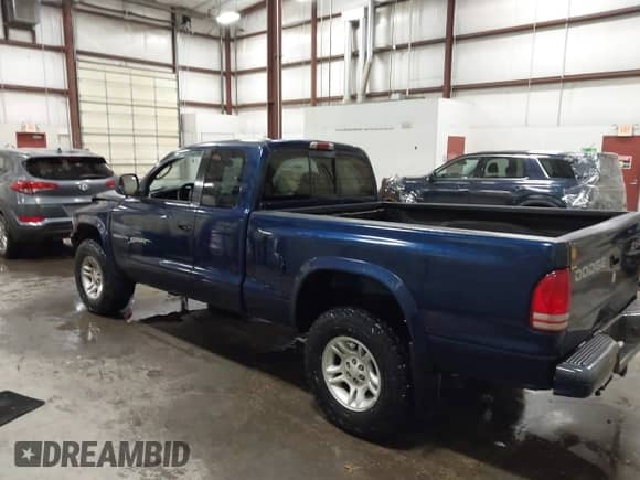 2001 Dodge Dakota Sport with VIN 1B7GG22N31S223895, listed as a IAAI auction lot 43367373 with Not provided miles and . Bid and sale history available at DreamBid. Image 3.