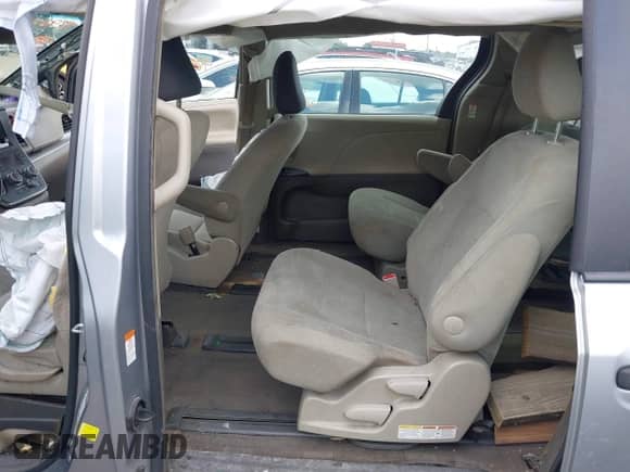 2016 Toyota Sienna L with VIN 5TDZK3DC6GS730865, listed as a IAAI auction lot 42969868 with 189,925 mi miles and . Bid and sale history available at DreamBid. Image 8.