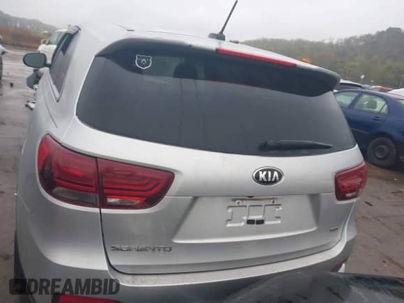 2019 Kia Sorento L with VIN 5XYPG4A34KG569263, listed as a IAAI auction lot 43390806 with 116,537 mi miles and . Bid and sale history available at DreamBid. Image 16.