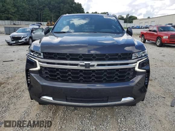 2023 Chevrolet Suburban LS с VIN 1GNSCBKD4PR403603, выставлен на аукционе Copart как лот 65908005 с пробегом 26 049 миль миль и Списание • Salvage title. История ставок и продаж доступна на DreamBid. Изображение 5.