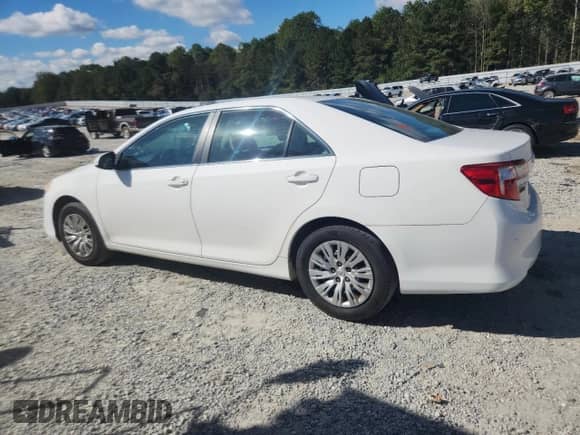 2014 Toyota Camry SE с VIN 4T1BF1FK6EU777283, выставлен на аукционе Copart как лот 82299905 с пробегом 90 577 миль миль и Списание • Salvage title. История ставок и продаж доступна на DreamBid. Изображение 2.