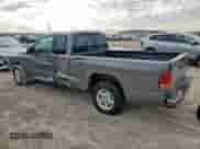 2001 Dodge Dakota z VIN 1B7GL22X91S341785, wystawiony jako Copart lot #90262095 z przebiegiem 164 468 mil mil oraz Szkoda całkowita • Salvage title. Historia ofert i sprzedaży dostępna na DreamBid. Obrazek 2.