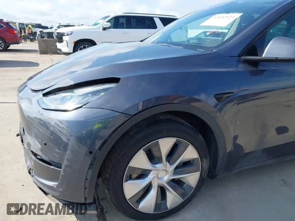 2022 Tesla Model Y Long Range z VIN 7SAYGAEE7NF389319, wystawiony jako IAAI lot #42492523 z przebiegiem Nie podano mil oraz . Historia ofert i sprzedaży dostępna na DreamBid. Obrazek 11.