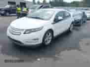 2013 Chevrolet Volt z VIN 1G1RA6E49DU145631, wystawiony jako IAAI lot #43327570 z przebiegiem 104 593 mil mil oraz . Historia ofert i sprzedaży dostępna na DreamBid. Obrazek 2.