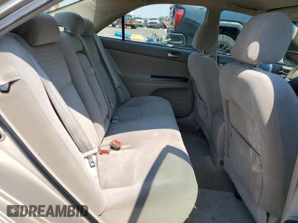 2006 Toyota Camry STD с VIN 4T1BE30K36U153837, выставлен на аукционе Copart как лот 71286925 с пробегом 76 272 миль миль и Списание • Salvage title. История ставок и продаж доступна на DreamBid. Изображение 10.