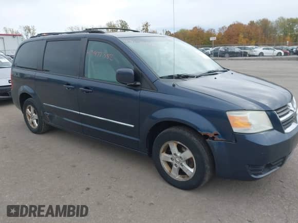 2009 Dodge Grand Caravan SXT with VIN 2D8HN54109R655560, listed as a IAAI auction lot 43472382 with 163,891 mi miles and . Bid and sale history available at DreamBid. Image 1.