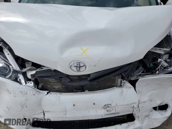 2012 Toyota Sienna with VIN 5TDZK3DC0CS233594, listed as a Copart auction lot 71744685 with 226,300 mi miles and Salvage title. Bid and sale history available at DreamBid. Image 12.