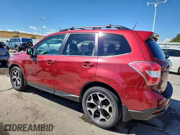 2014 Subaru Forester XT Touring z VIN JF2SJGMC1EH409721, wystawiony jako Copart lot #81140985 z przebiegiem 78 296 mil mil oraz Szkoda całkowita • Salvage title. Historia ofert i sprzedaży dostępna na DreamBid. Obrazek 2.