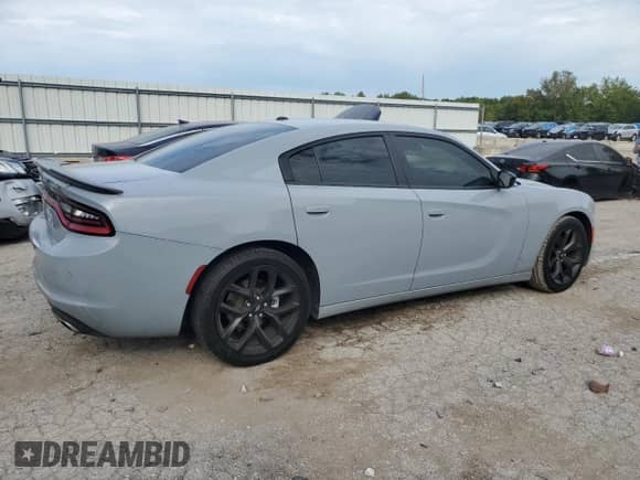 2020 Dodge Charger SXT с VIN 2C3CDXBG1LH241283, выставлен на аукционе Copart как лот 71236575 с пробегом 326 856 миль миль и Списание • Salvage title. История ставок и продаж доступна на DreamBid. Изображение 3.