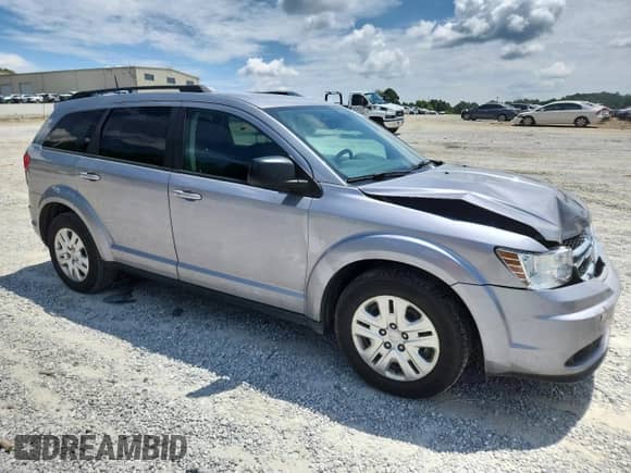 2019 Dodge Journey SE Value with VIN 3C4PDCAB7KT858219, listed as a Copart auction lot 64083545 with 135,753 mi miles and Salvage title. Bid and sale history available at DreamBid. Image 4.
