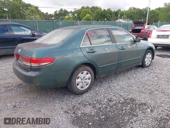 2003 Honda Accord LX with VIN 1HGCM56473A086318, listed as a IAAI auction lot 42950611 with 137,157 mi miles and . Bid and sale history available at DreamBid. Image 4.