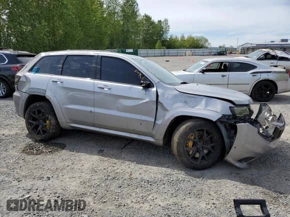 2018 Jeep Grand Cherokee Trackhawk z VIN 1C4RJFN98JC408289, wystawiony jako Copart lot #55948525 z przebiegiem 54 043 mil mil oraz Szkoda całkowita • Salvage title. Historia ofert i sprzedaży dostępna na DreamBid. Obrazek 4.