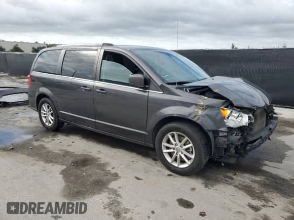 2018 Dodge Grand Caravan SXT with VIN 2C4RDGCG0JR226138, listed as a Copart auction lot 85570965 with 125,805 mi miles and Salvage title. Bid and sale history available at DreamBid. Image 4.