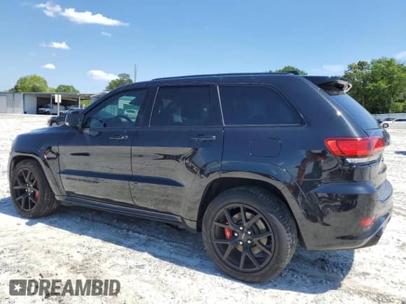 2016 Jeep Grand Cherokee SRT с VIN 1C4RJFDJ0GC491060, выставлен на аукционе Copart как лот 55730895 с пробегом 96 827 миль миль и Списание • Salvage title. История ставок и продаж доступна на DreamBid. Изображение 2.