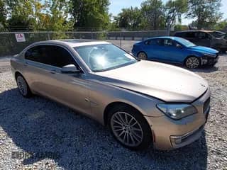 2013 BMW 7 Series 750Li xDrive with VIN WBAYF8C52DD141011, listed as a IAAI auction lot 43241297 with 183,579 mi miles and . Bid and sale history available at DreamBid. Image 1.