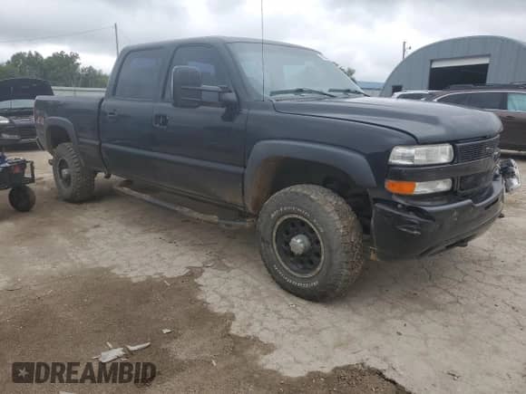 2002 Chevrolet Silverado 2500HD LS с VIN 1GCHK23U62F205135, выставлен на аукционе Copart как лот 71025955 с пробегом 255 159 миль миль и Списание • Salvage title. История ставок и продаж доступна на DreamBid. Изображение 4.