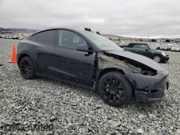 2023 Tesla Model Y Long Range с VIN 7SAYGDEE3PF691274, выставлен на аукционе Copart как лот 66070715 с пробегом 182 482 миль миль и Списание • Salvage title. История ставок и продаж доступна на DreamBid. Изображение 4.