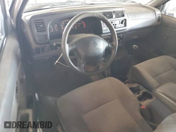 1999 Nissan Frontier XE с VIN 1N6ED26Y8XC303584, выставлен на аукционе Copart как лот 81721435 с пробегом 212 087 миль миль и Списание • Salvage title. История ставок и продаж доступна на DreamBid. Изображение 8.