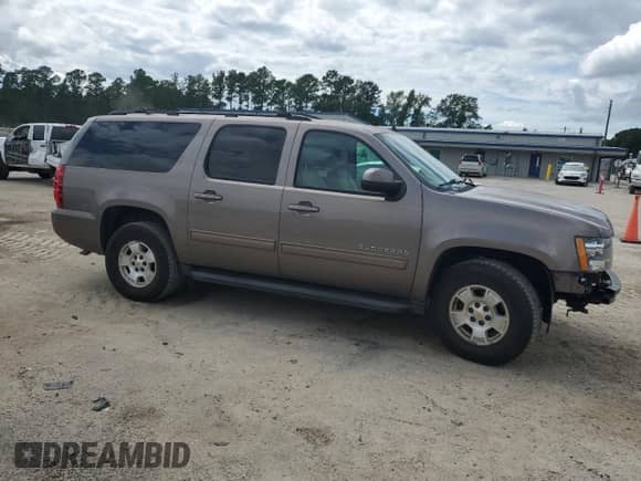 2013 Chevrolet Suburban LS с VIN 1GNSCHE0XDR368024, выставлен на аукционе Copart как лот 68806075 с пробегом 108 550 миль миль и Списание • Salvage title. История ставок и продаж доступна на DreamBid. Изображение 4.