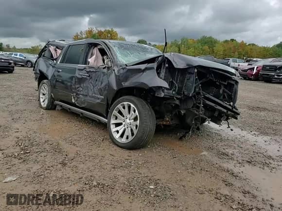 2015 Chevrolet Suburban LTZ z VIN 1GNSKKKC6FR600135, wystawiony jako Copart lot #81775095 z przebiegiem Nie podano mil oraz Szkoda całkowita • Salvage title. Historia ofert i sprzedaży dostępna na DreamBid. Obrazek 14.