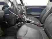 2012 MINI Hardtop with VIN WMWSU3C56CT261218, listed as a Copart auction lot 60810455 with 60,770 mi miles and Salvage title. Bid and sale history available at DreamBid. Image 7.