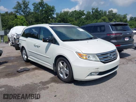 2012 Honda Odyssey Touring с VIN 5FNRL5H99CB115300, выставлен на аукционе IAAI как лот 42890660 с пробегом 120 808 миль миль и . История ставок и продаж доступна на DreamBid. Изображение 1.