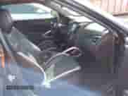 2013 Hyundai Veloster Turbo с VIN KMHTC6AE8DU156928, выставлен на аукционе IAAI как лот 43471857 с пробегом 103 265 миль миль и . История ставок и продаж доступна на DreamBid. Изображение 5.