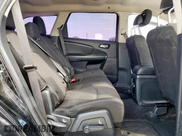 2015 Dodge Journey American Value with VIN 3C4PDCAB9FT583703, listed as a Copart auction lot 81931965 with 132,413 mi miles and Salvage title. Bid and sale history available at DreamBid. Image 11.