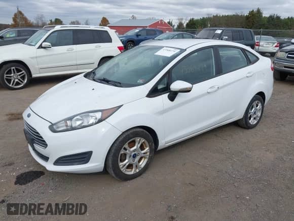 2015 Ford Fiesta SE with VIN 3FADP4BJ8FM126161, listed as a IAAI auction lot 43568274 with 138,715 mi miles and . Bid and sale history available at DreamBid. Image 2.
