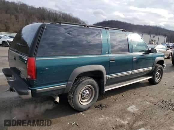 1995 Chevrolet Suburban с VIN 1GNGK26K8SJ406190, выставлен на аукционе Copart как лот 84103234 с пробегом 145 731 миль миль и Чистый • Clean title. История ставок и продаж доступна на DreamBid. Изображение 3.