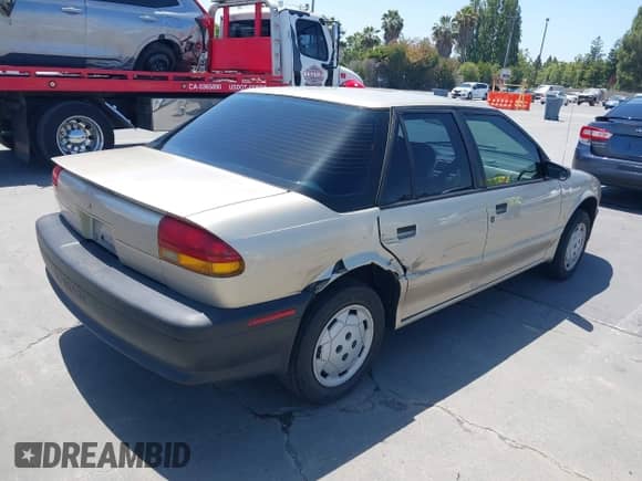 1993 Saturn SL with VIN 1G8ZF5593PZ201935, listed as a IAAI auction lot 42493004 with 200,987 mi miles and . Bid and sale history available at DreamBid. Image 4.