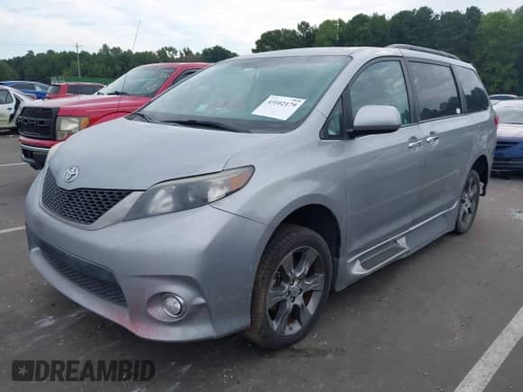 2014 Toyota Sienna SE with VIN 5TDXK3DC6ES421515, listed as a IAAI auction lot 43102179 with 63,756 mi miles and . Bid and sale history available at DreamBid. Image 2.