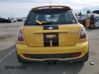 2009 MINI Hardtop S with VIN WMWMF73599TW87679, listed as a Copart auction lot 46863725 with 102,976 mi miles and Salvage title. Bid and sale history available at DreamBid. Image 6.