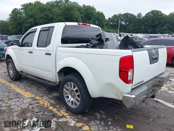 2013 Nissan Frontier SV with VIN 1N6AD0ER6DN729965, listed as a IAAI auction lot 42917426 with 158,426 mi miles and . Bid and sale history available at DreamBid. Image 3.