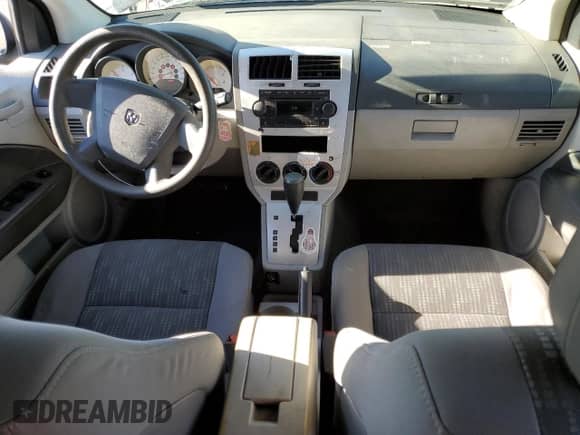 2007 Dodge Caliber with VIN 1B3HB28BX7D104403, listed as a Copart auction lot 69458045 with 202,184 mi miles and Salvage title. Bid and sale history available at DreamBid. Image 8.