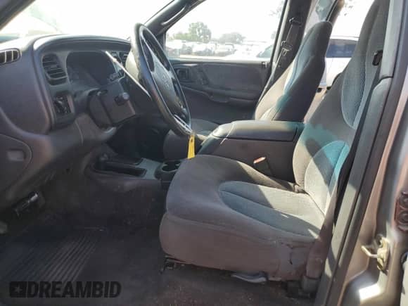 1999 Dodge Durango with VIN 1B4HS28Y8XF574563, listed as a Copart auction lot 59997105 with 236,037 mi miles and Salvage title. Bid and sale history available at DreamBid. Image 7.