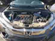 2022 Honda HR-V LX z VIN 3CZRU6H31NM722816, wystawiony jako IAAI lot #43155997 z przebiegiem 65 443 mil mil oraz . Historia ofert i sprzedaży dostępna na DreamBid. Obrazek 10.