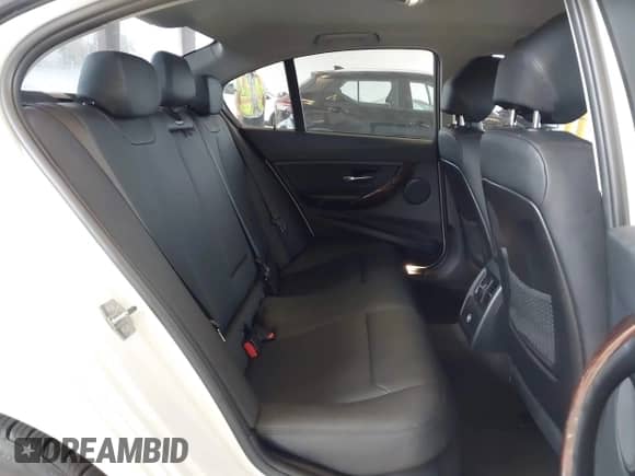 2014 BMW 3 Series 328i with VIN WBA3C1C57EK117469, listed as a IAAI auction lot 43207455 with 77,275 mi miles and . Bid and sale history available at DreamBid. Image 8.