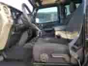 2023 Jeep Wrangler Sport S with VIN 1C4HJXDG7PW617662, listed as a Copart auction lot 86186065 with 34,124 mi miles and Salvage title. Bid and sale history available at DreamBid. Image 7.