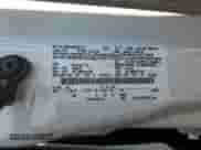 2013 Ford Focus Titanium z VIN 1FADP3J25DL168564, wystawiony jako Copart lot #80250465 z przebiegiem 111 505 mil mil oraz Szkoda całkowita • Salvage title. Historia ofert i sprzedaży dostępna na DreamBid. Obrazek 12.