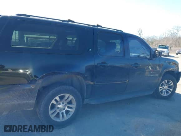 2013 Chevrolet Suburban LT с VIN 1GNSCJE03DR227545, выставлен на аукционе IAAI как лот 41569589 с пробегом 162 821 миль миль и . История ставок и продаж доступна на DreamBid. Изображение 13.