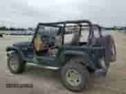 1998 Jeep Wrangler SE z VIN 1J4FY29P1WP763752, wystawiony jako Copart lot #70510885 z przebiegiem 228 480 mil mil oraz Szkoda całkowita • Salvage title. Historia ofert i sprzedaży dostępna na DreamBid. Obrazek 2.