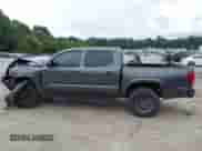 2020 Toyota Tacoma SR with VIN 3TMCZ5AN4LM314973, listed as a IAAI auction lot 42955800 with 94,693 mi miles and . Bid and sale history available at DreamBid. Image 14.