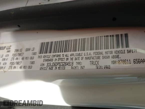 2012 Ram 1500 ST z VIN 3C6JD6DP5CG264518, wystawiony jako IAAI lot #41103265 z przebiegiem 145 791 mil mil oraz . Historia ofert i sprzedaży dostępna na DreamBid. Obrazek 9.