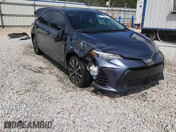 2019 Toyota Corolla LE z VIN 5YFBURHE4KP857447, wystawiony jako Copart lot #70769985 z przebiegiem 104 352 mil mil oraz Szkoda całkowita • Salvage title. Historia ofert i sprzedaży dostępna na DreamBid. Obrazek 14.