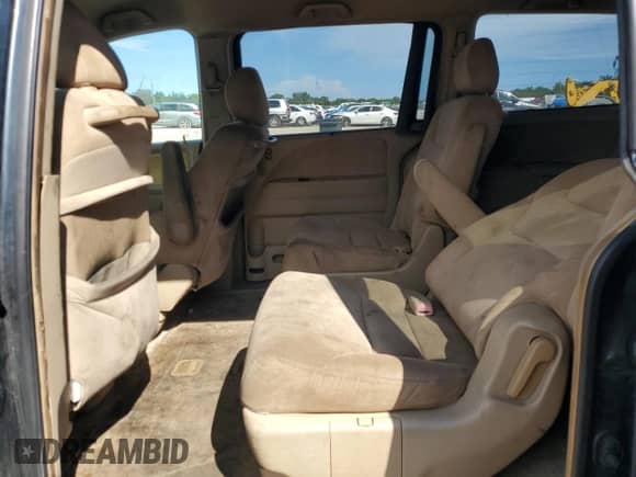 2005 Honda Odyssey EX с VIN 5FNRL38495B401224, выставлен на аукционе Copart как лот 80556355 с пробегом 258 303 миль миль и Списание • Salvage title. История ставок и продаж доступна на DreamBid. Изображение 11.