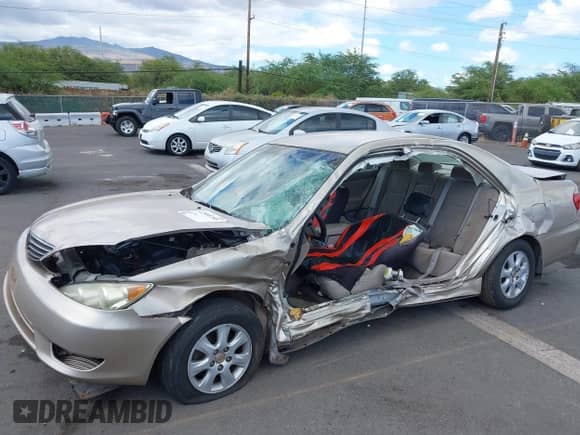 2005 Toyota Camry LE with VIN JTDBF30K150158395, listed as a IAAI auction lot 42998789 with Not provided miles and . Bid and sale history available at DreamBid. Image 6.