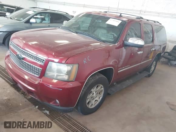 2009 Chevrolet Suburban LTZ with VIN 1GNFC36089J105491, listed as a IAAI auction lot 42509904 with 198,740 mi miles and . Bid and sale history available at DreamBid. Image 17.